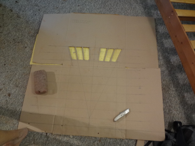 Cardboard sketch and cutouts of how the bricks will be cut to form the jack arch.
