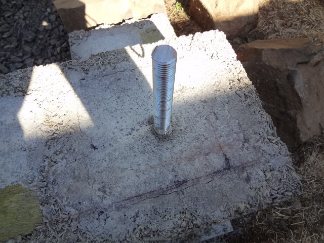 Metal posts in our concrete form, one at each corner