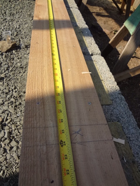 Laying out stud placement on bottom plate