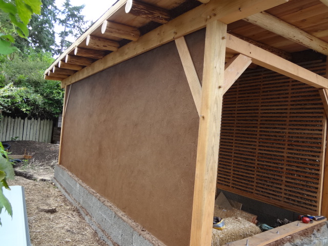 Base plaster completed on light clay straw wall